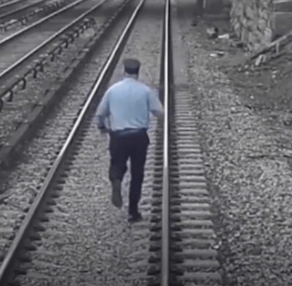 Two railway employees notice a 3-year-old boy with autism on the train tracks and quickly take action to rescue him.