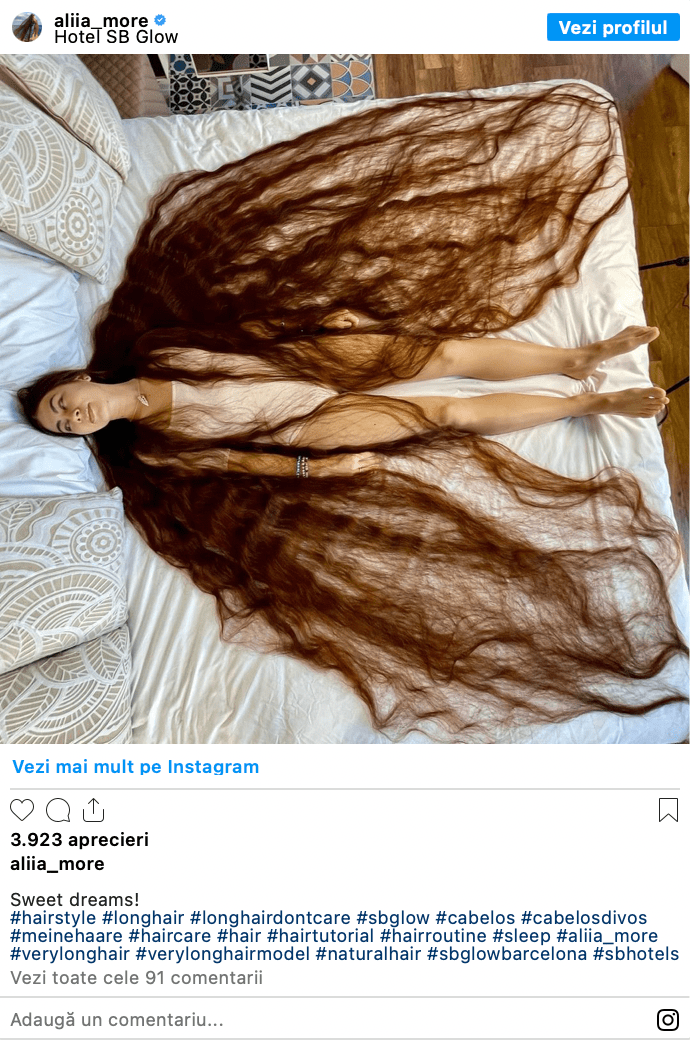 This real-life Rapunzel has 90 inches of long, flowing brown hair that reaches the ground behind her.