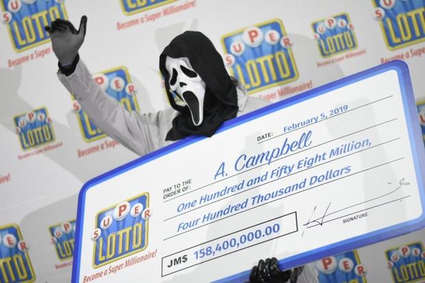 Lottery winner dons Scream mask to claim £1 million jackpot to prevent money demands from relatives and family