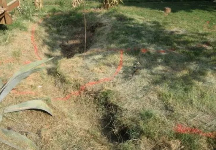 They noticed him digging huge holes and filling soil sacks in the backyard.