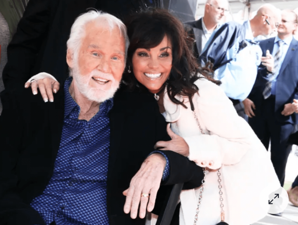 Kenny Rogers’ widow recalls his encouraging her to find someone after he died.