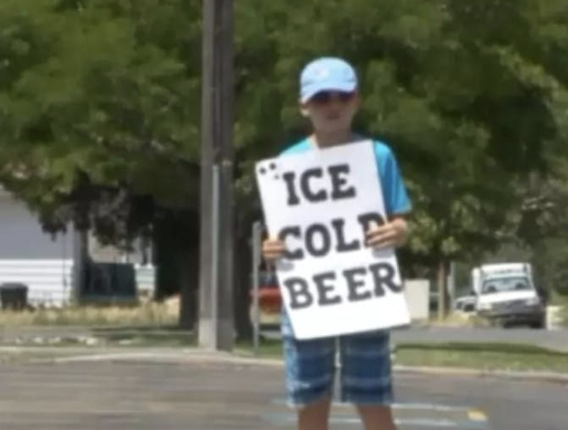 A Young Entrepreneur Makes a Splash with “Ice Cool Beer” Stand